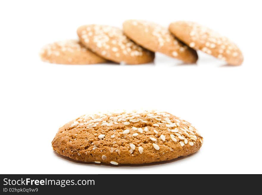 A stack of chocolate chip cookies isolated on a white background.