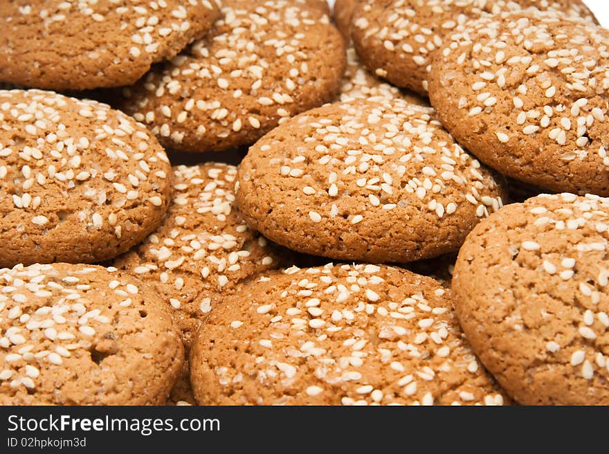 A pile of chocolate chip cookies isolated on a white background