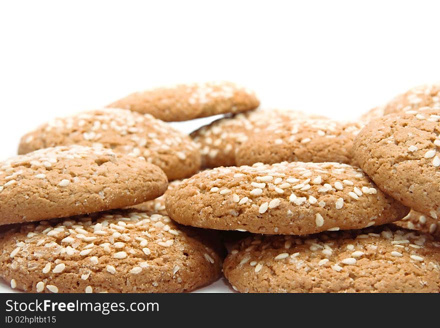 A pile of chocolate chip cookies isolated on a white background