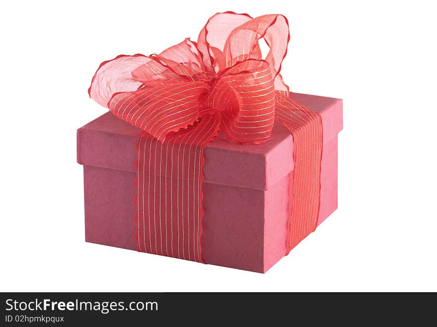 Red gift box with red bow isolated on white background. Red gift box with red bow isolated on white background