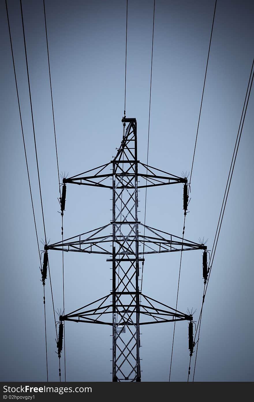 Detail of power pole and blue background