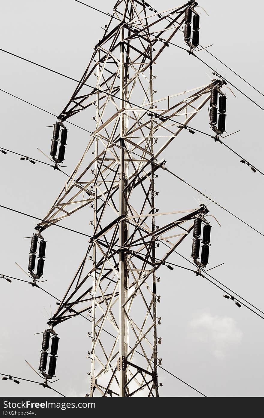 Detail of power pole and grey sky