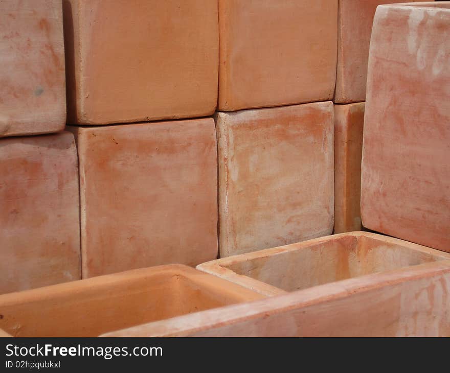 Many tiled terracotta plant pots. Many tiled terracotta plant pots