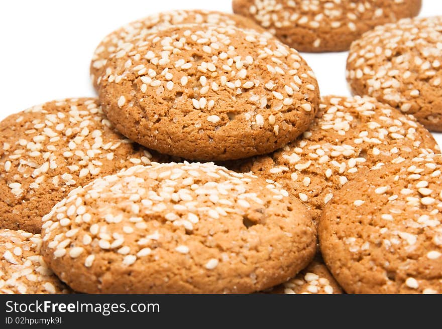 A pile of chocolate chip cookies isolated on a white background