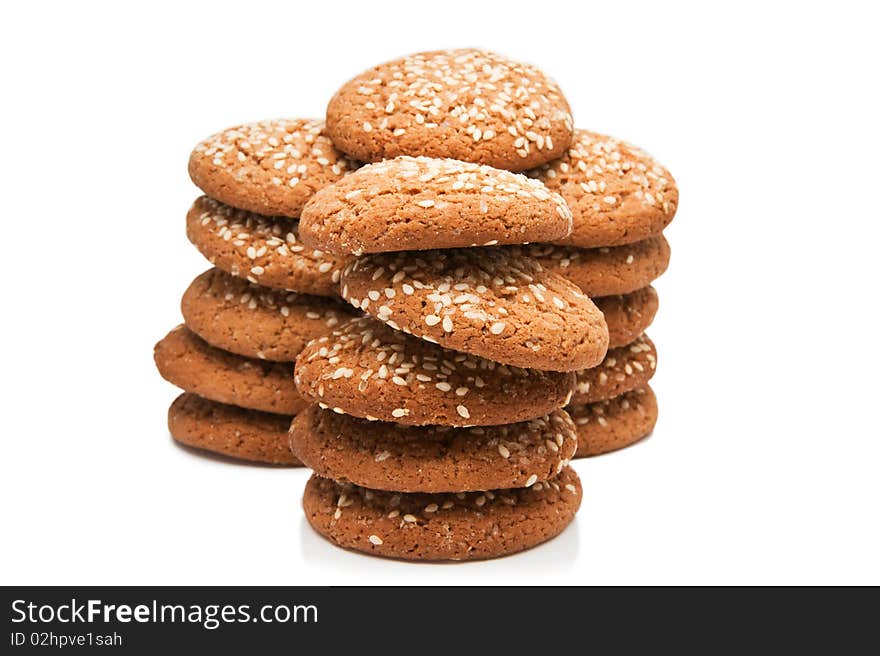 A stack of chocolate chip cookies isolated on a white background.