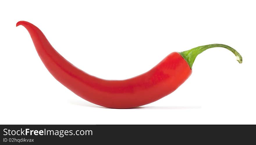 Red pepper isolated on white background. Macro photo. Red pepper isolated on white background. Macro photo.