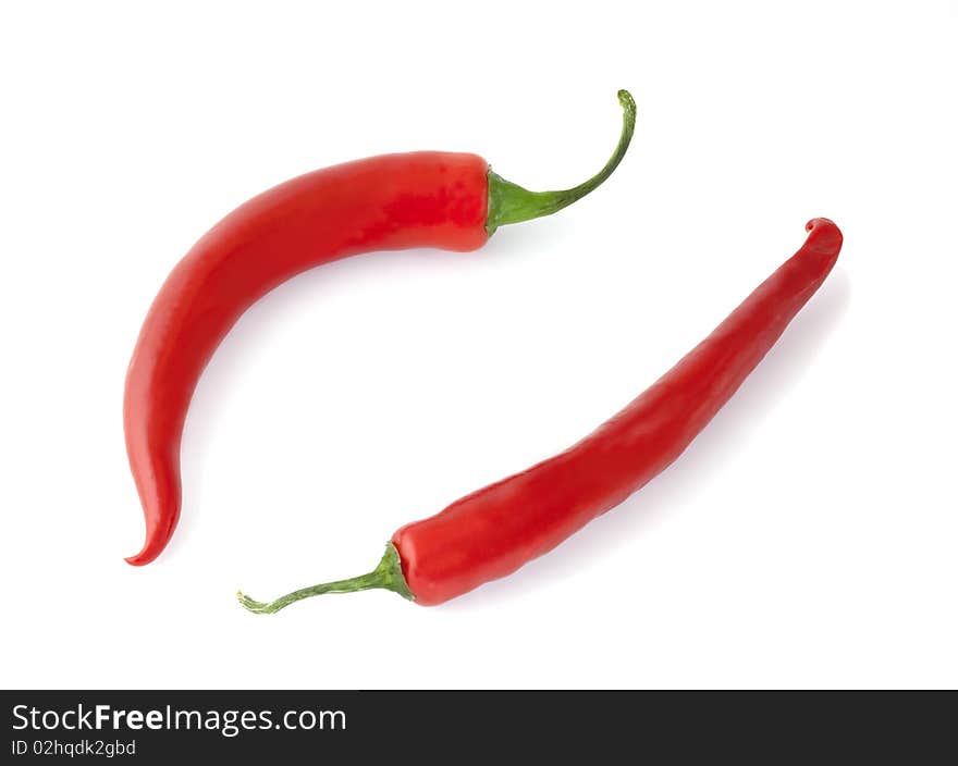 Red peppers isolated on white background. Macro photo.