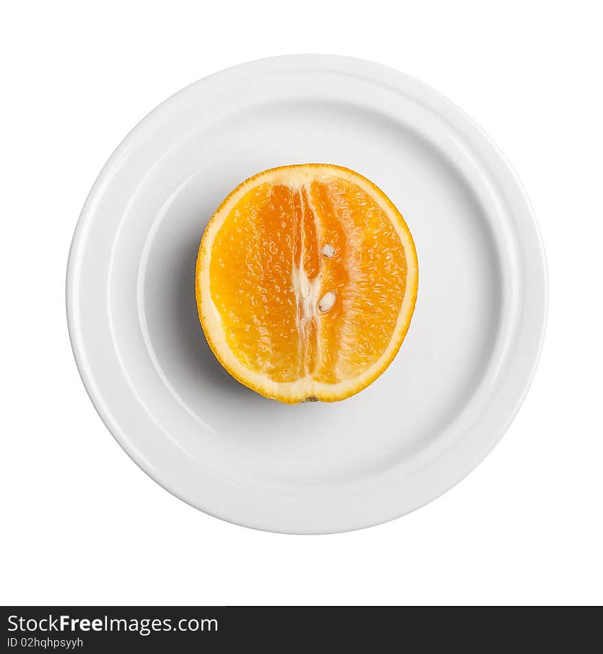 Orange on white plate (isolated)