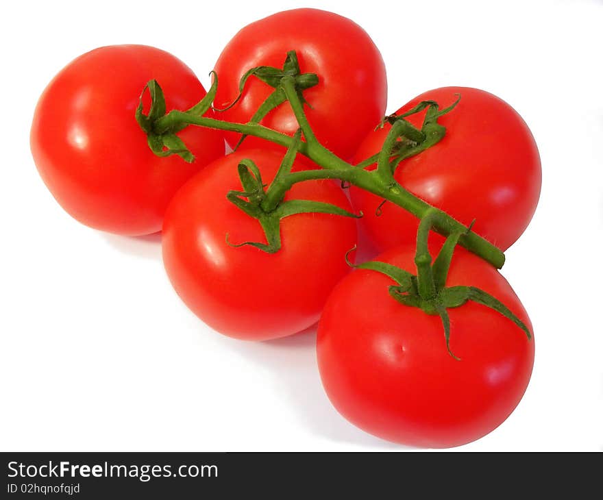 Juicy red tomatoes isolated on white background