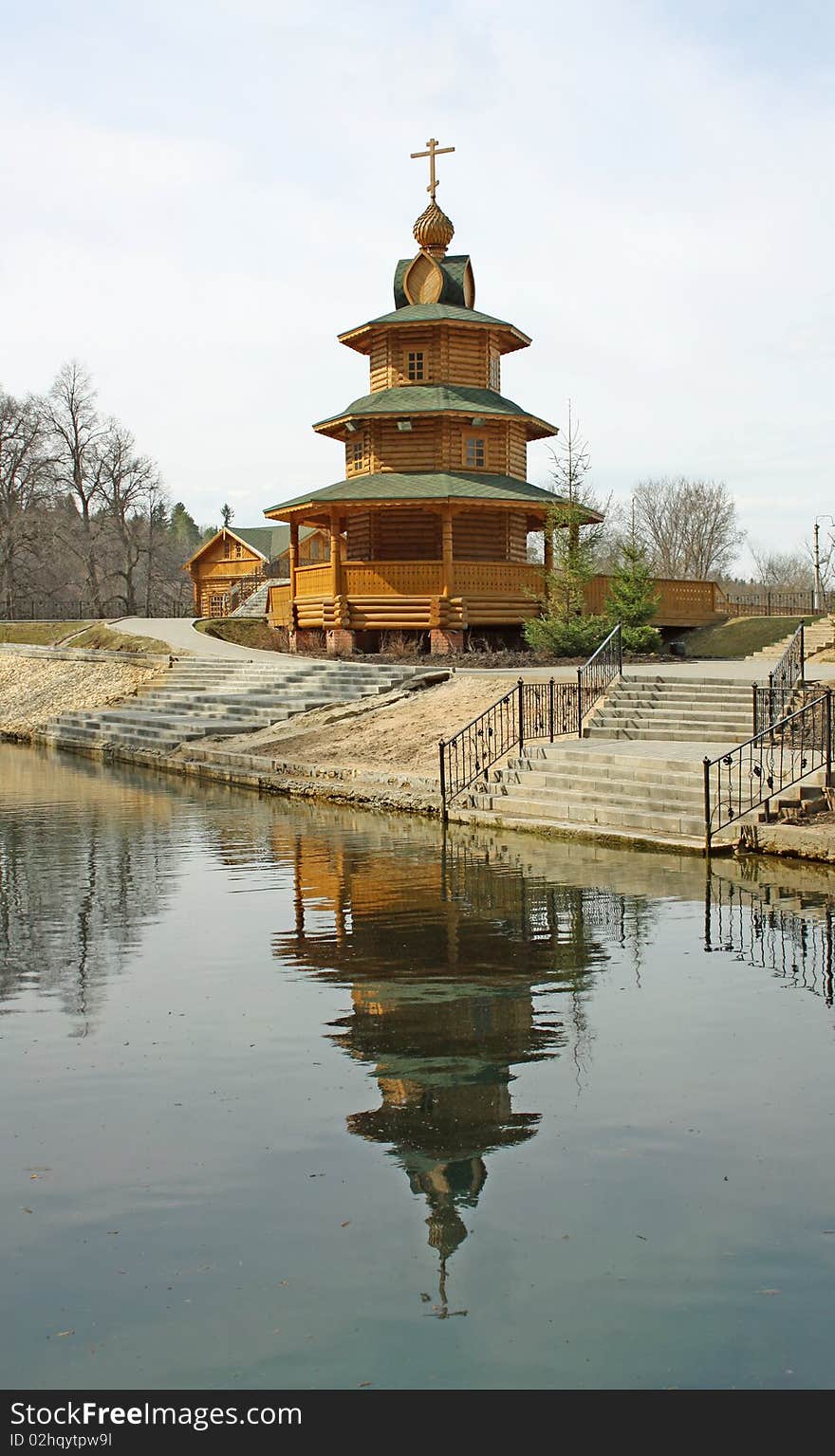 Belltower on the bank of a sacred source