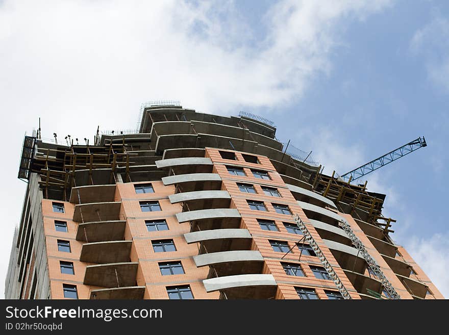 Modern big house under construction with crane. Modern big house under construction with crane