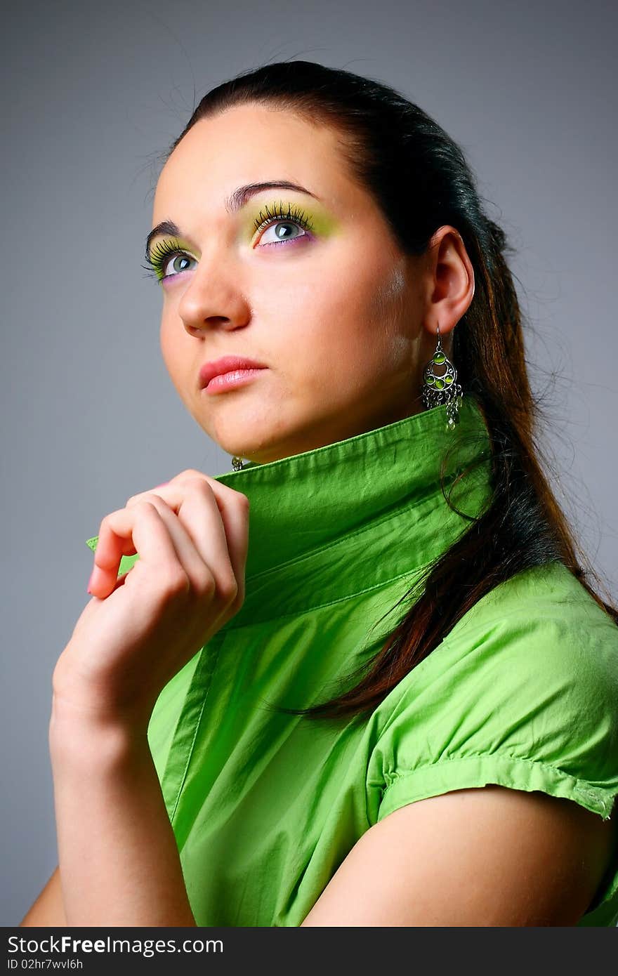 Multicolored make-up. Portrait of young beautiful woman.