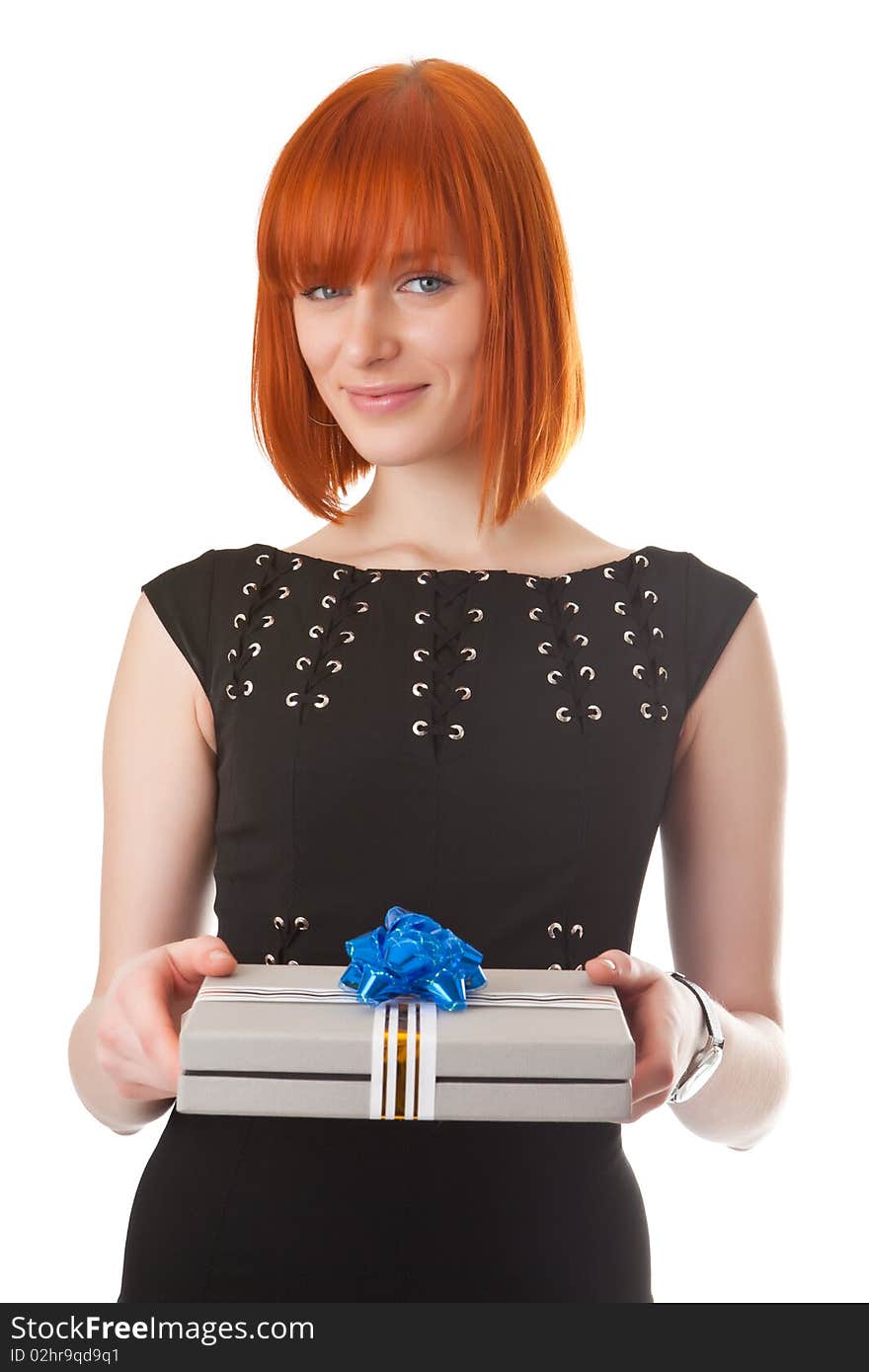 Beautiful red girl with a gift in hands