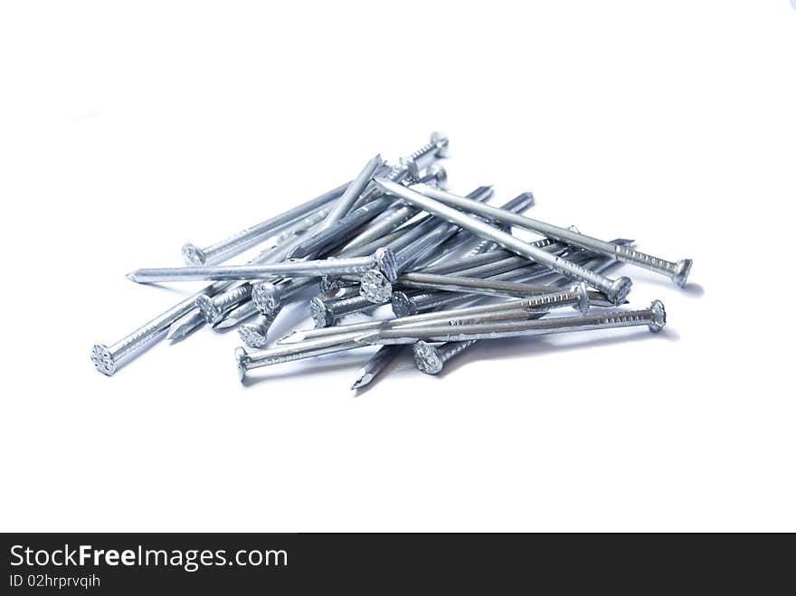 Pile of iron nails. Isolated on the white