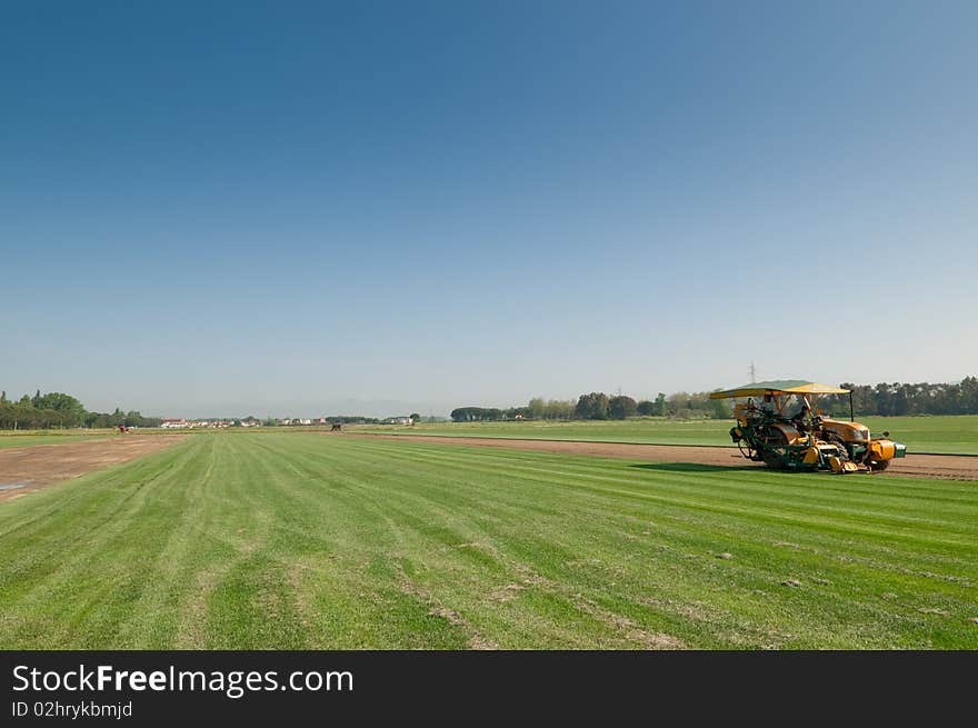 Machinery on commercial turf fields. Machinery on commercial turf fields