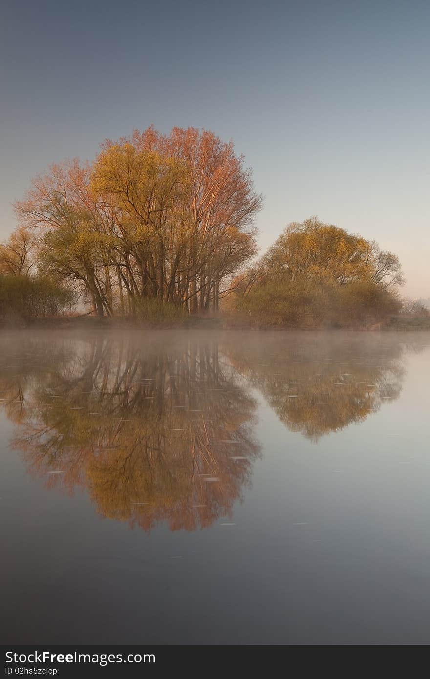 Reflection and mist on the river