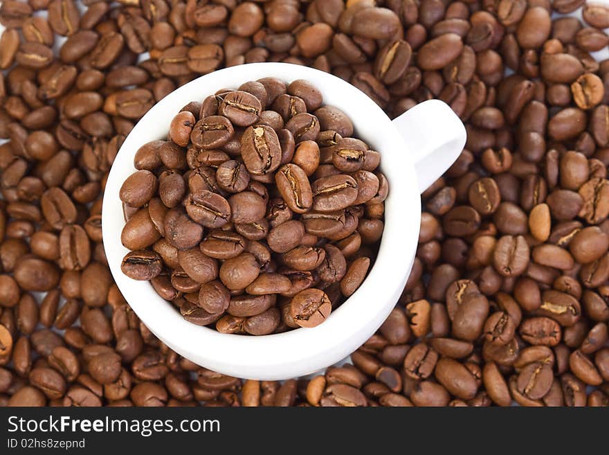 Cup with coffee beans