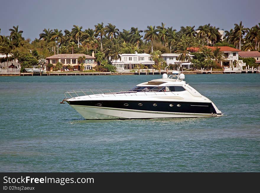 Luxury sport fishig boat off of Sunset Island on the florida intercoastal waterway in Miami Beach. Luxury sport fishig boat off of Sunset Island on the florida intercoastal waterway in Miami Beach