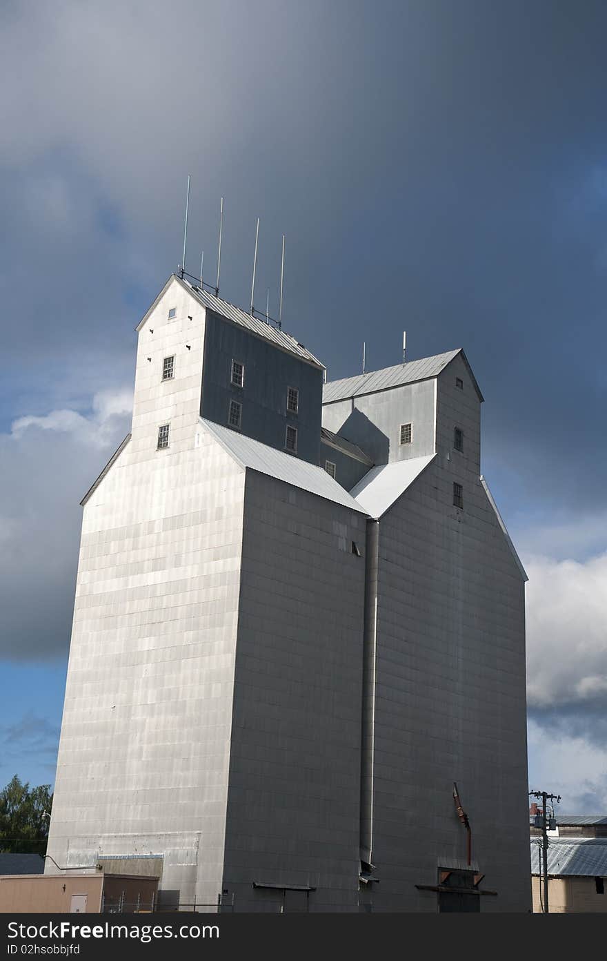 Tall grain elevator in rural countryside of America