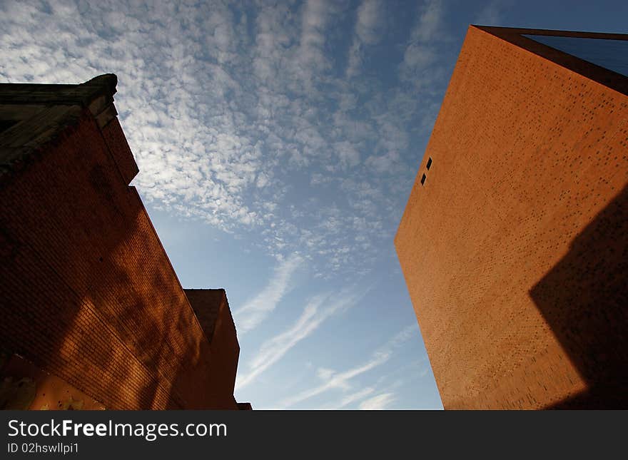 Two buildings in downtown Greensboro, North Carolina angled agains the sky. Two buildings in downtown Greensboro, North Carolina angled agains the sky