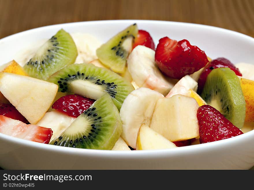 Delicious fresh fruit salad in bowl