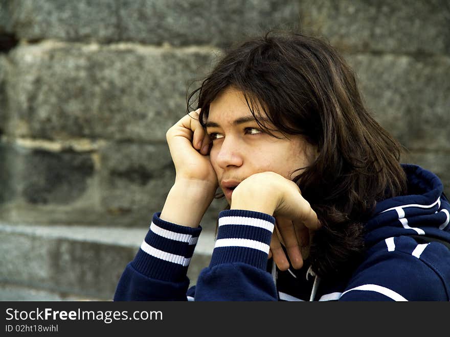 Portrait of a boy with long hair. Portrait of a boy with long hair