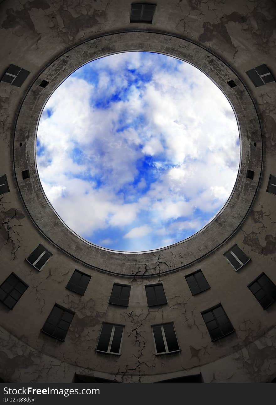 Piece of blue sky over the yard pit.