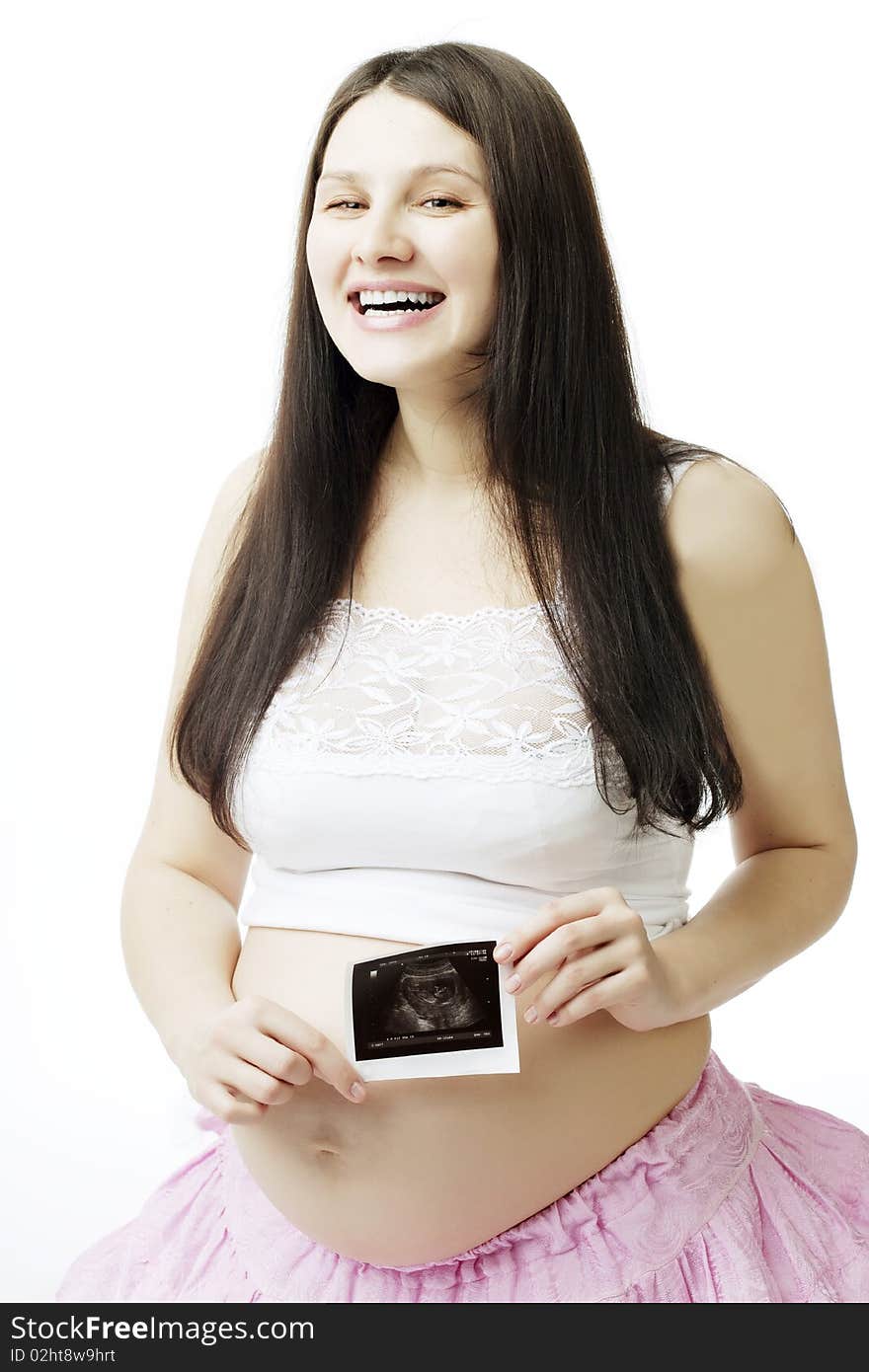 The image of a pregnant woman with a photograph of ultrasound.