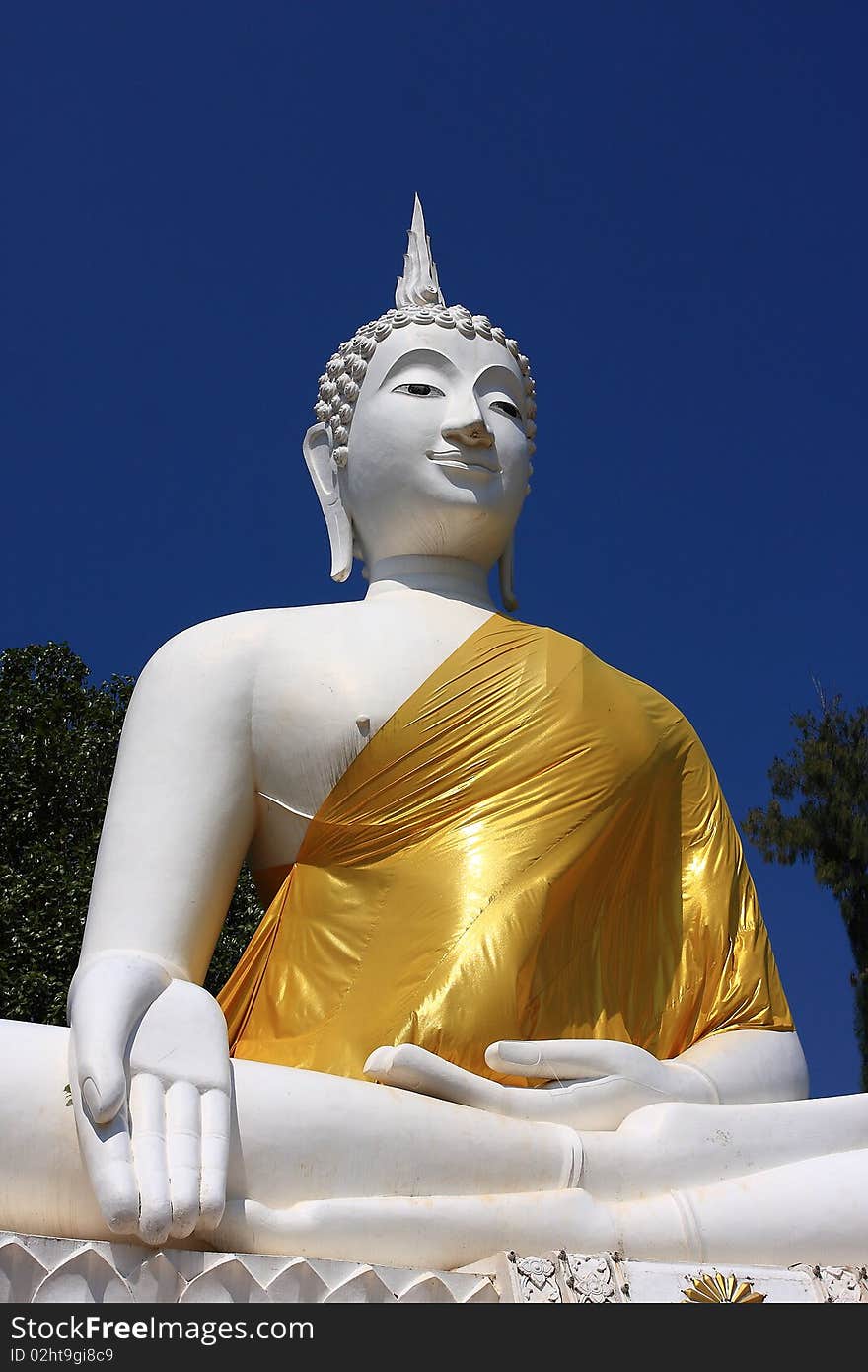 Large white Buddha cut the blue sky