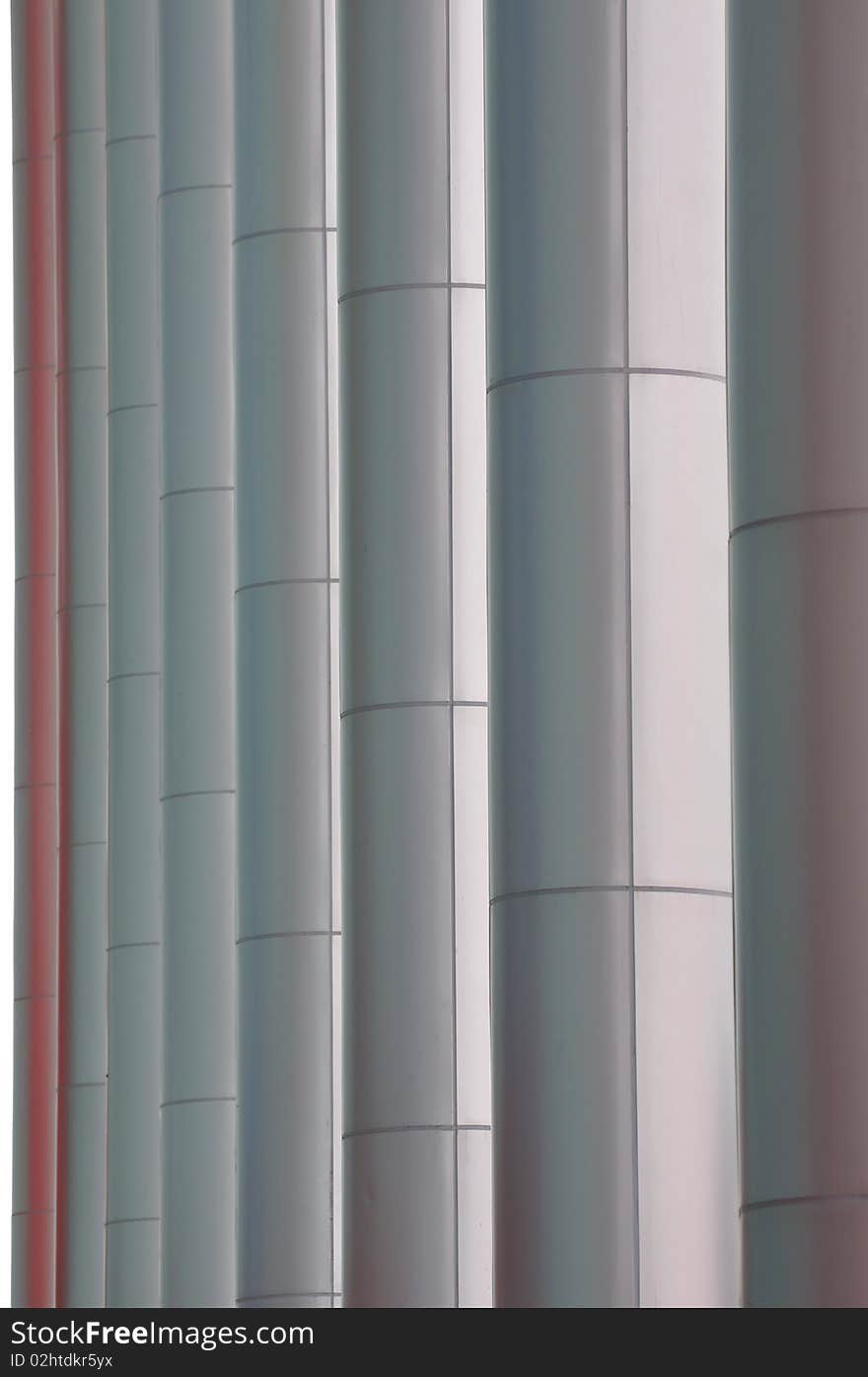 Poles in line of modern building, shown as repeated shape and regular rhythm, can be used as background. Poles in line of modern building, shown as repeated shape and regular rhythm, can be used as background