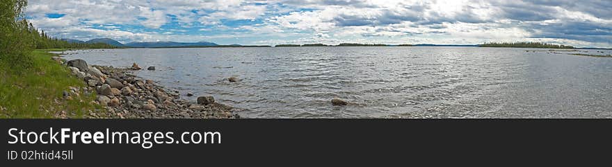 Panorama of cloudy day on coast of White Sea