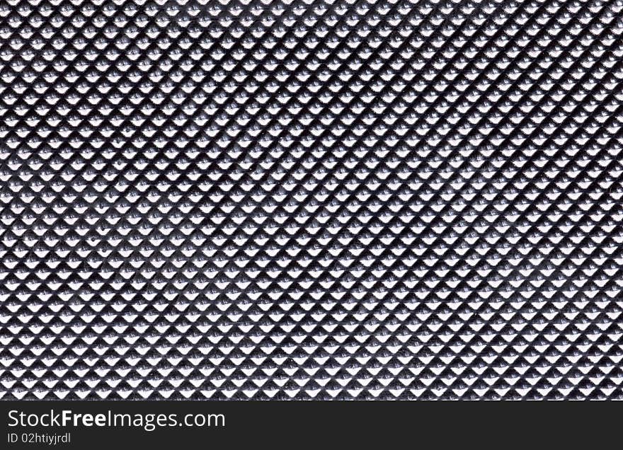 Metal background with dotts pattern