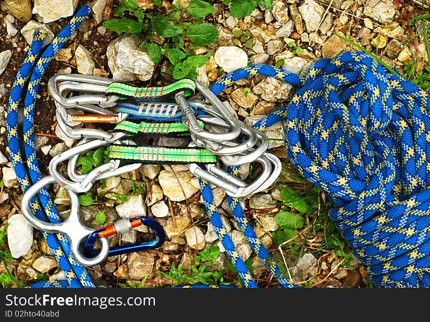 Blue climbing rope and carabiners. Blue climbing rope and carabiners