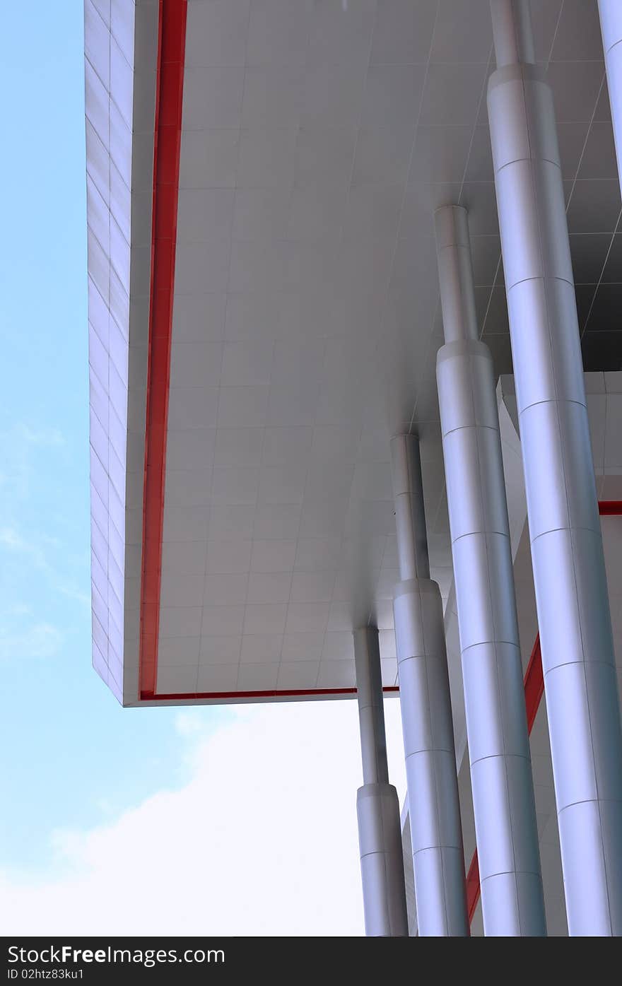 Poles in line of modern building, shown as repeated shape and regular rhythm, and cover under blue sky. Poles in line of modern building, shown as repeated shape and regular rhythm, and cover under blue sky.