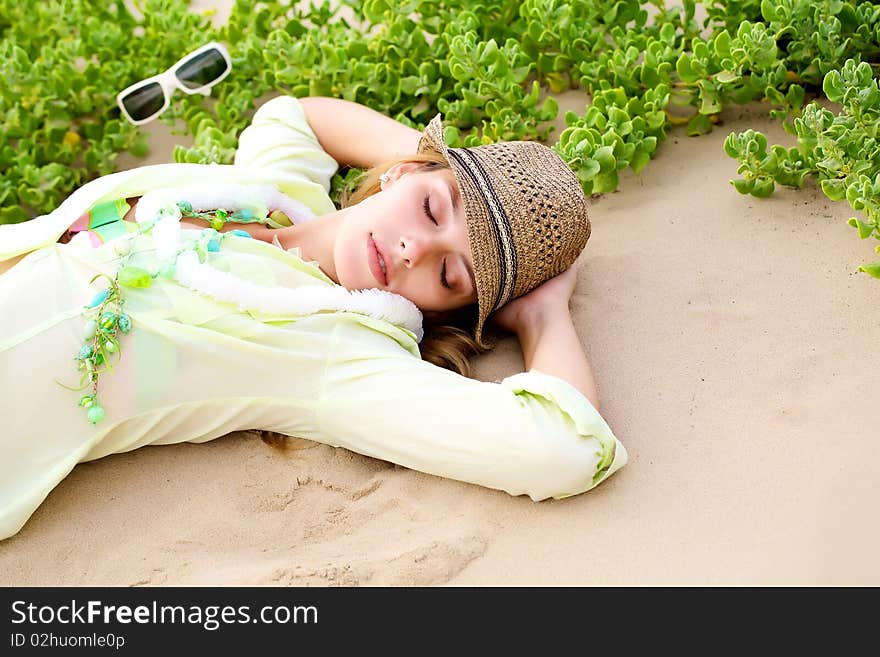 Gilr Lying On Beach