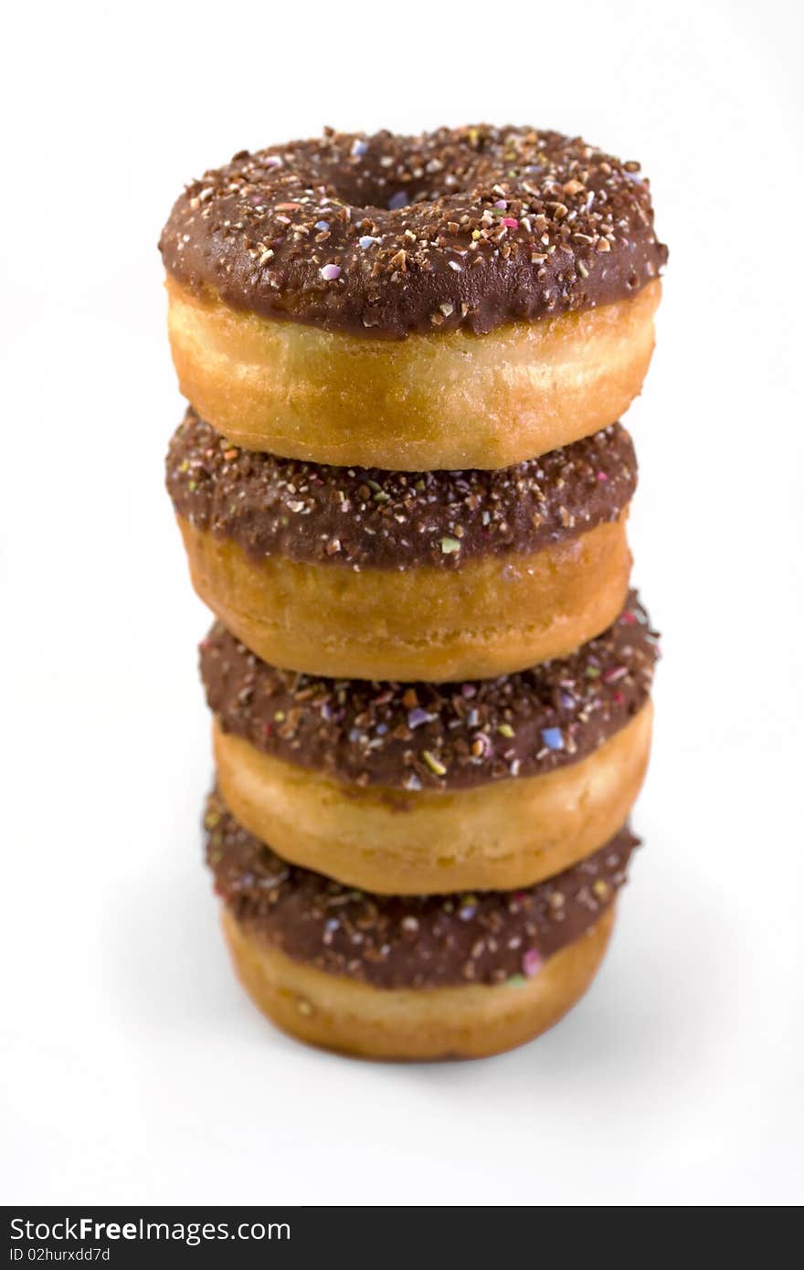 Stack of doughnuts over white