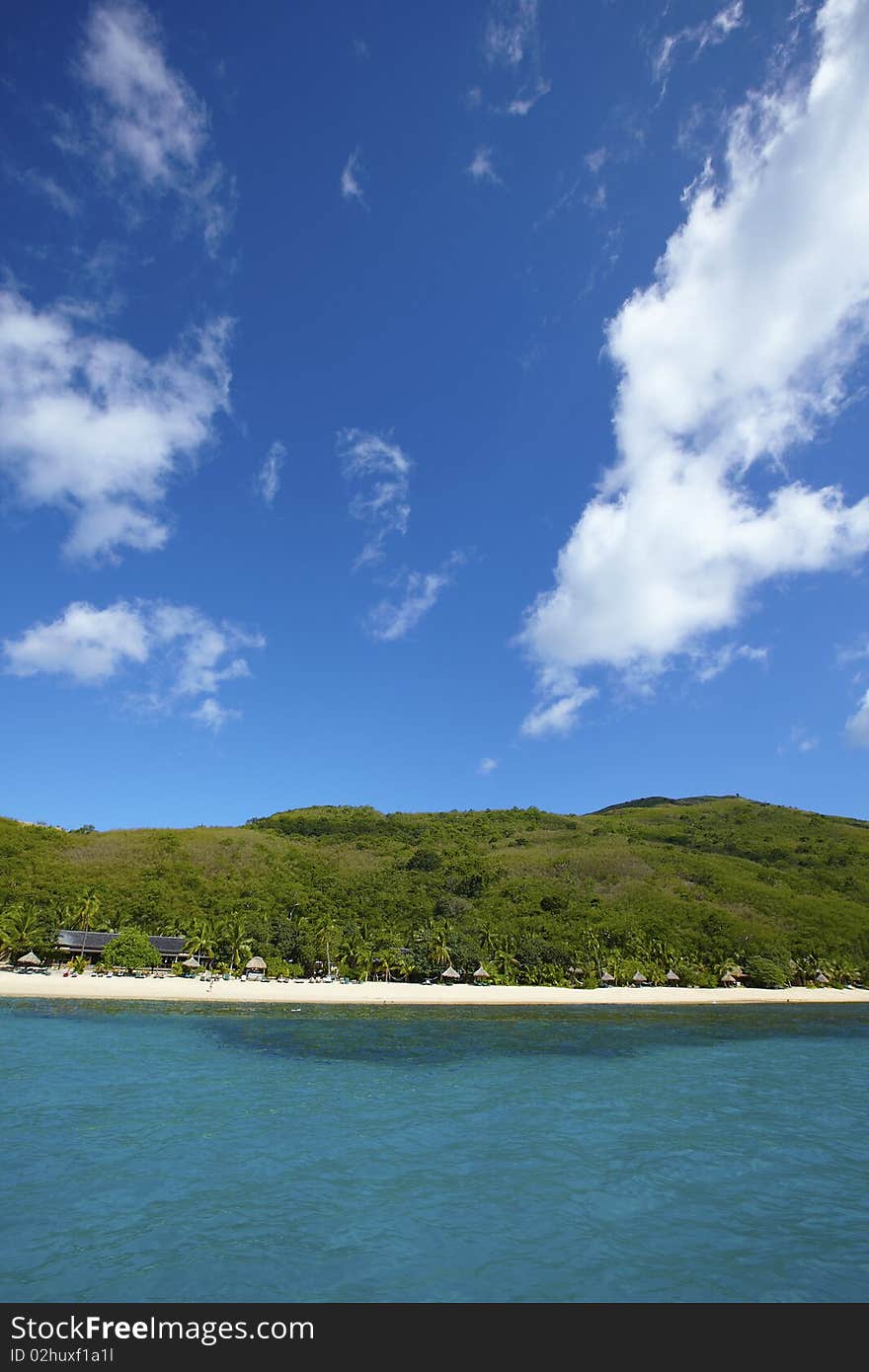 Tropical island with deep blue sea