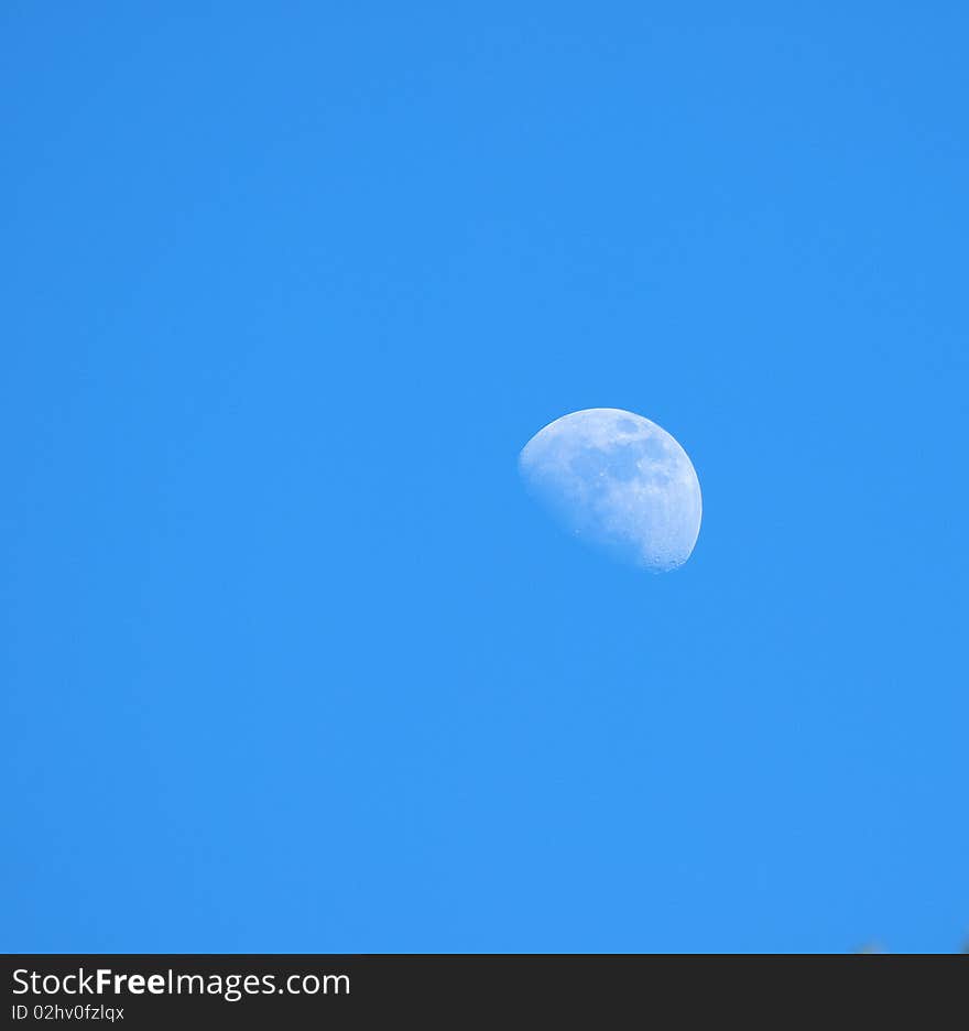 Moon at blue sky during afternoon