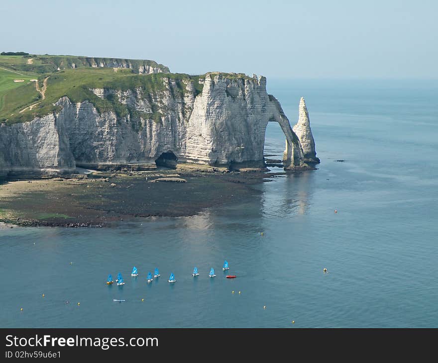 White cliffs and natural arch on the coast of France near the town of Etretat in Normandy