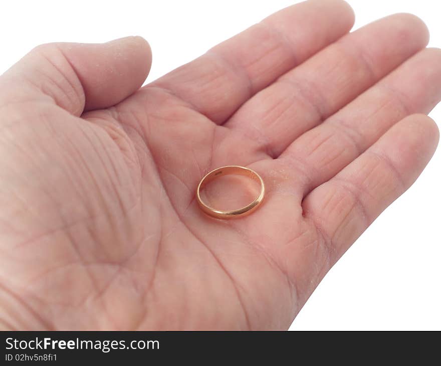 Wedding ring in hand