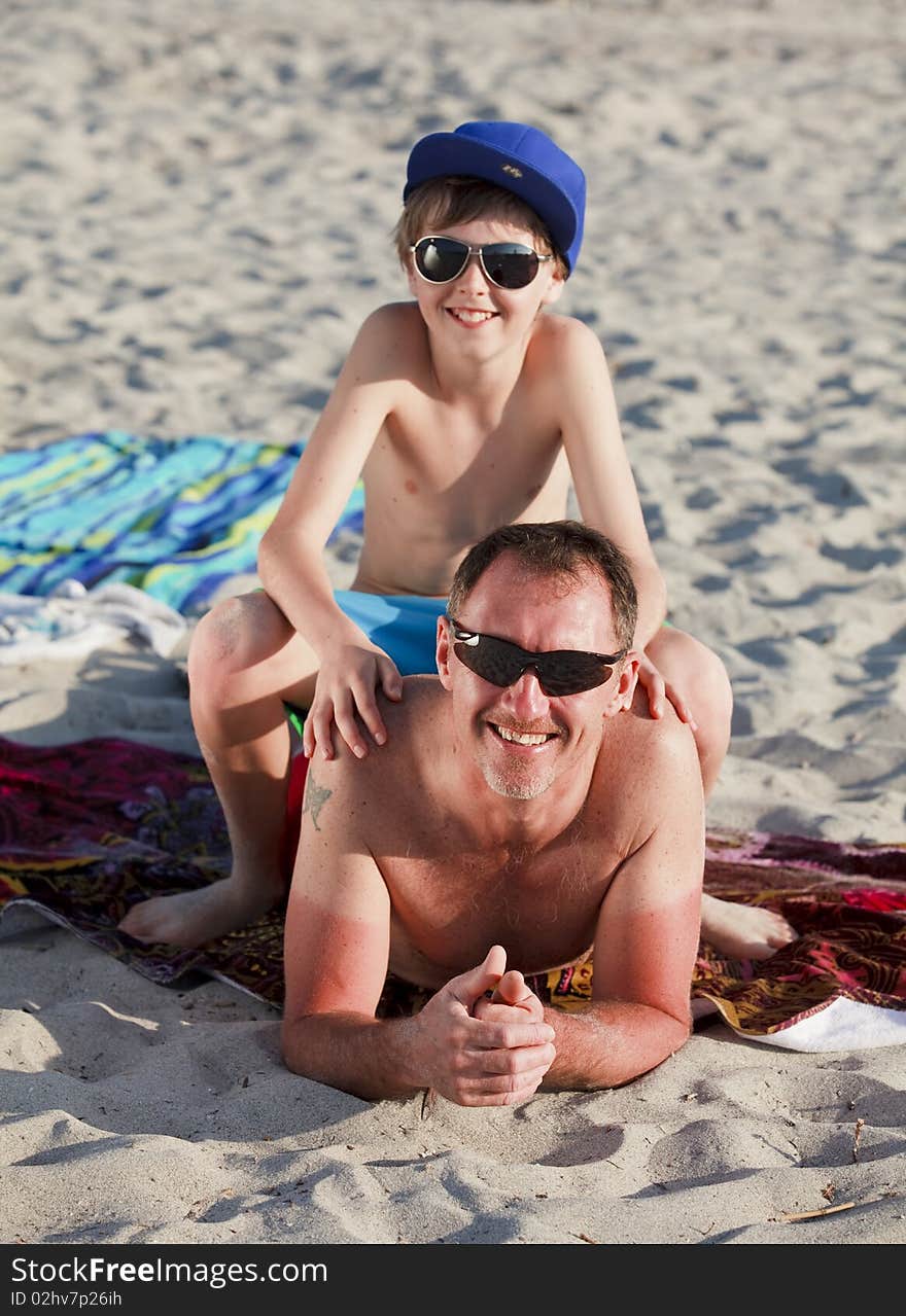 Father and Son Enjoying the Beach