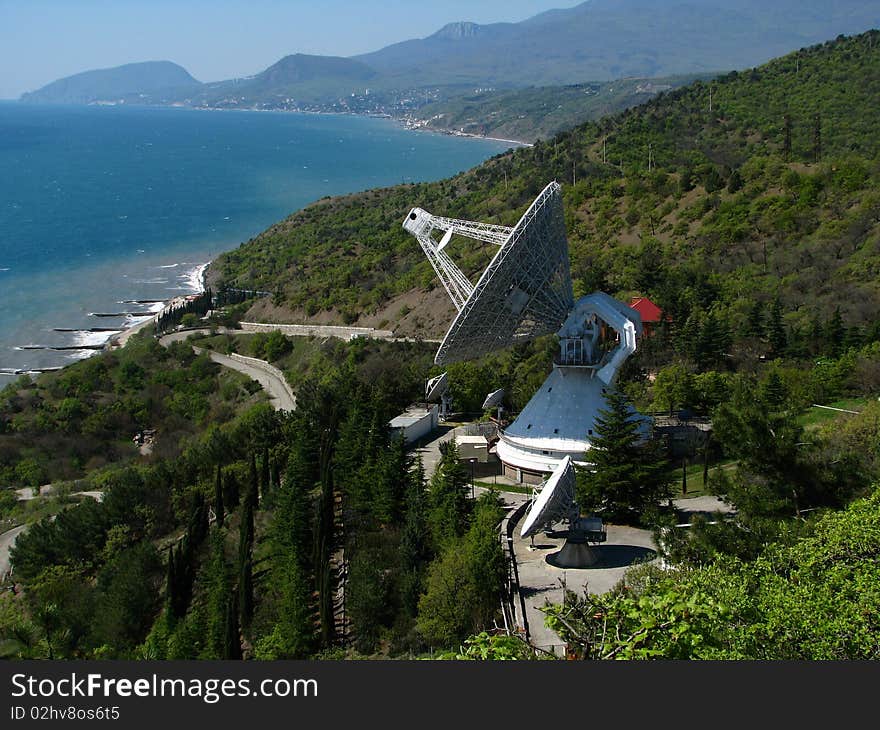 The satellite aerial of tracking at picturesque coast of the black sea. The satellite aerial of tracking at picturesque coast of the black sea.