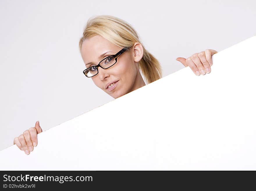 Businesswoman holding blank sign isolated on white. Businesswoman holding blank sign isolated on white