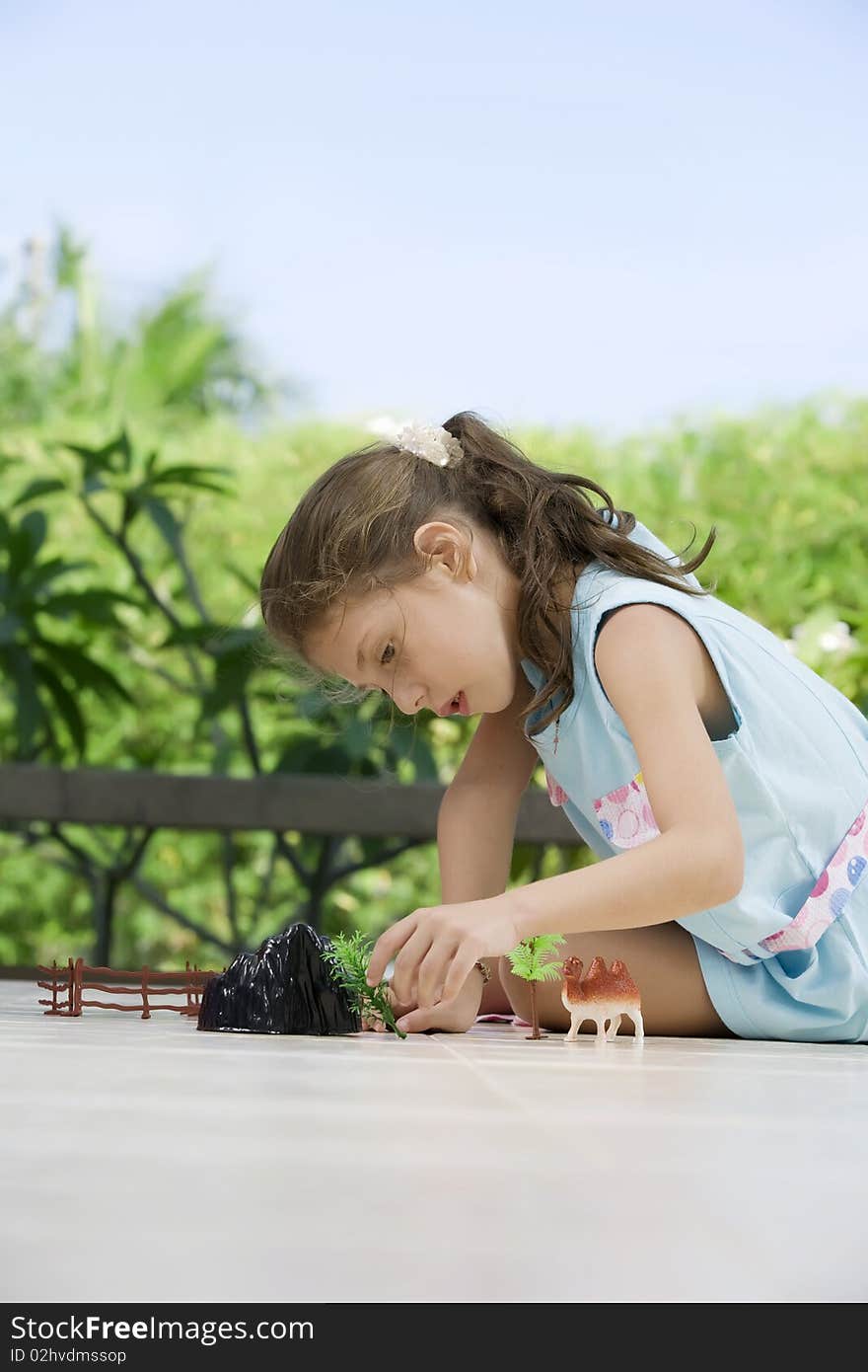 Portrait of little girl   having good time in summer environment. Portrait of little girl   having good time in summer environment