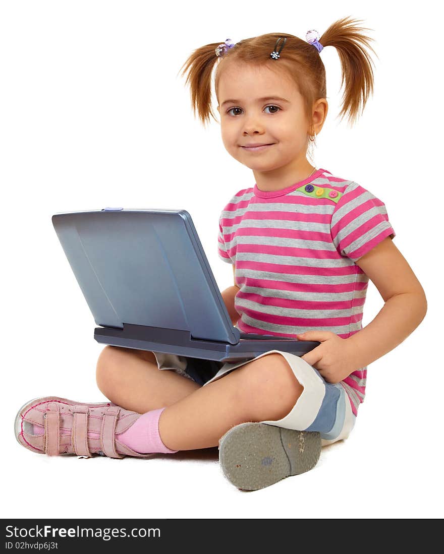 Little funny girl with laptop