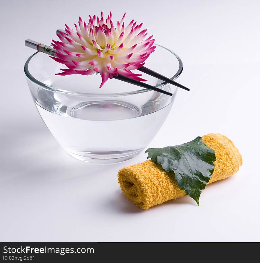 Flower floating on the Chinese sticks in bowl