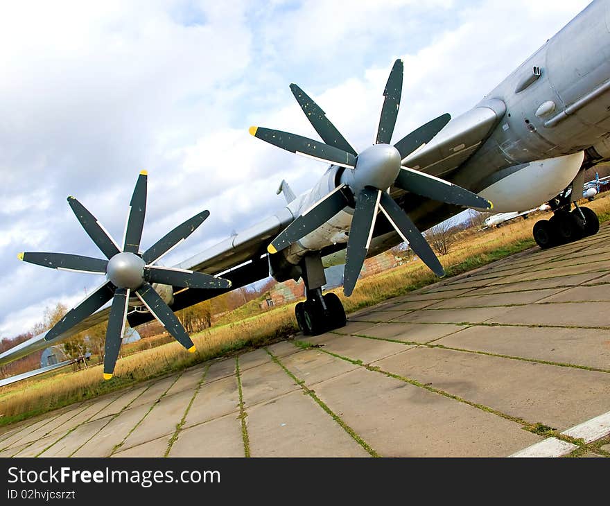 Wing of military plane with propellers