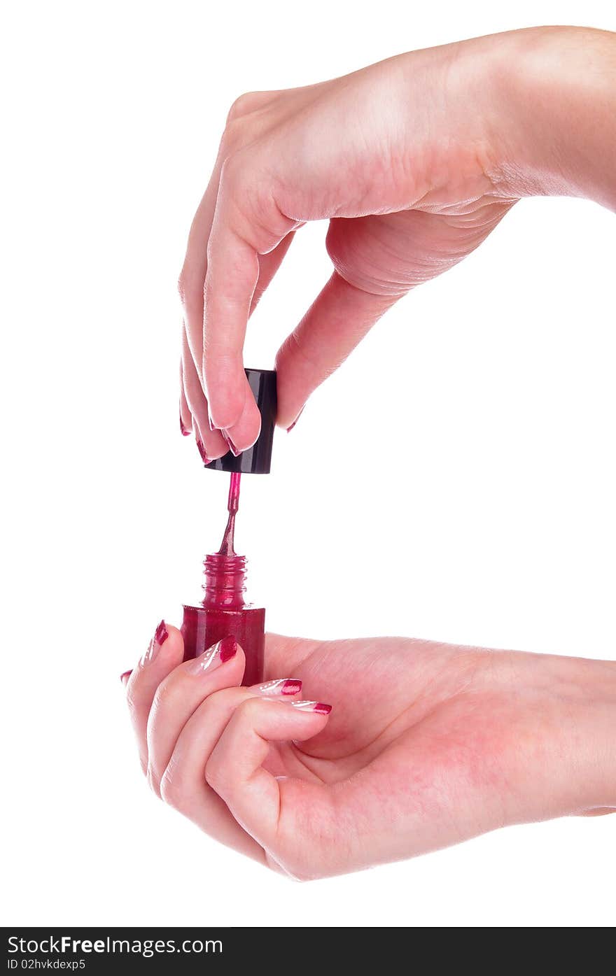 Woman painting nails with white background