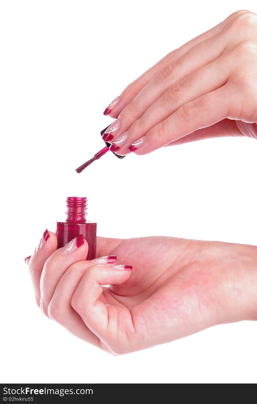 Woman painting nails with white background. Woman painting nails with white background