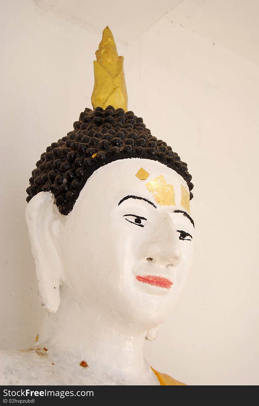 Buddha image head in the old temple in the north of Thailand